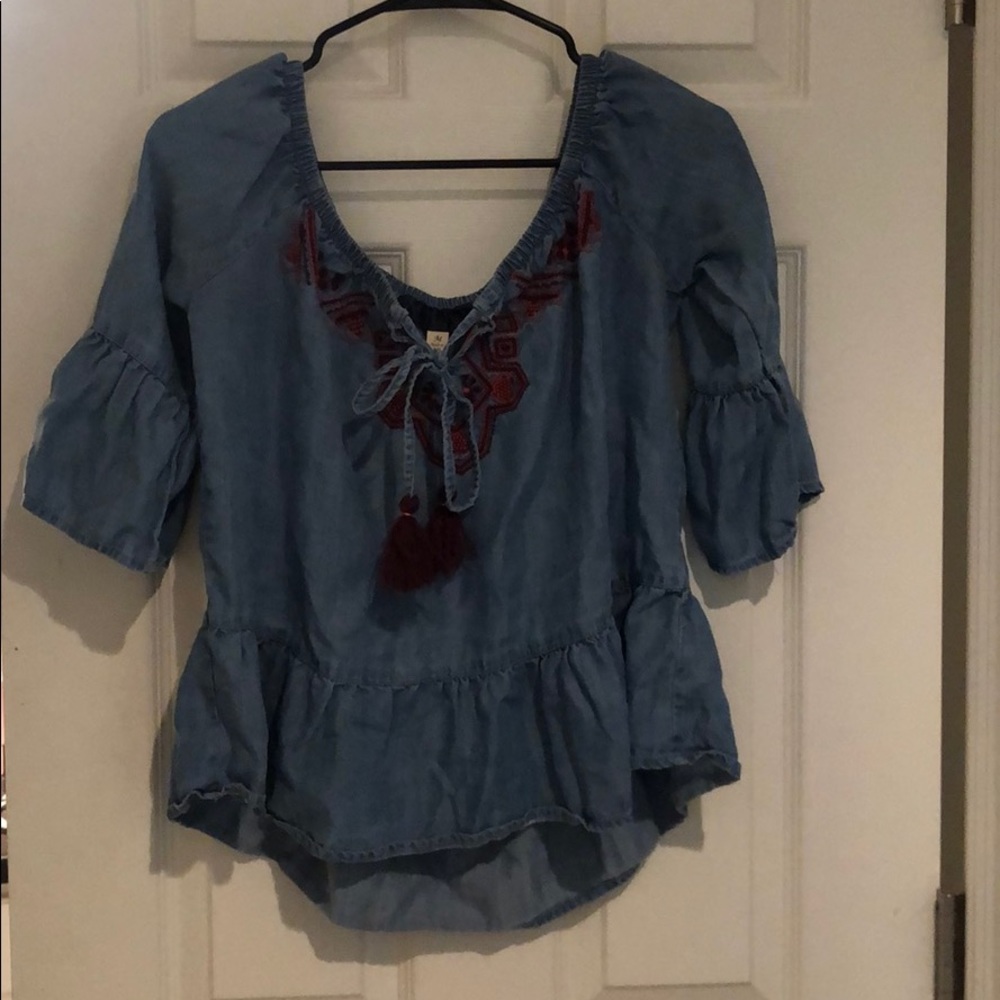 Francesca’s blue top